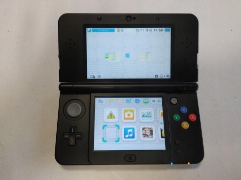 KONSOLA NEW NINTENDO 3DS CZARNA + RYSIK + ŁADOWARKA KONSOLA NEW NINTENDO 3DS CZARNA + RYSIK + ŁADOWARKA