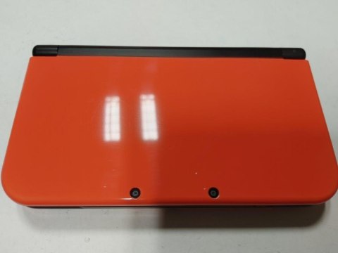 KONSOLA NEW NINTENDO 3DS XL POMARAŃCZOWO-CZARNA + RYSIK + ŁADOWARKA + ETUI KONSOLA NEW NINTENDO 3DS XL POMARAŃCZOWO-CZARNA + RYSIK + ŁADOWARKA + ETUI