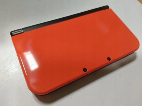 KONSOLA NEW NINTENDO 3DS XL POMARAŃCZOWO-CZARNA + RYSIK + ŁADOWARKA + ETUI KONSOLA NEW NINTENDO 3DS XL POMARAŃCZOWO-CZARNA + RYSIK + ŁADOWARKA + ETUI