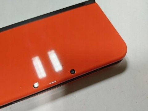 KONSOLA NEW NINTENDO 3DS XL POMARAŃCZOWO-CZARNA + RYSIK + ŁADOWARKA + ETUI KONSOLA NEW NINTENDO 3DS XL POMARAŃCZOWO-CZARNA + RYSIK + ŁADOWARKA + ETUI