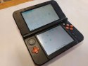 KONSOLA NEW NINTENDO 3DS XL POMARAŃCZOWO-CZARNA + RYSIK + ŁADOWARKA