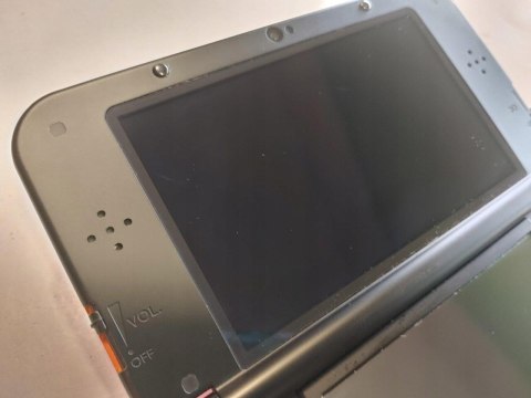 KONSOLA NEW NINTENDO 3DS XL POMARAŃCZOWO-CZARNA + RYSIK + ŁADOWARKA KONSOLA NEW NINTENDO 3DS XL POMARAŃCZOWO-CZARNA + RYSIK + ŁADOWARKA