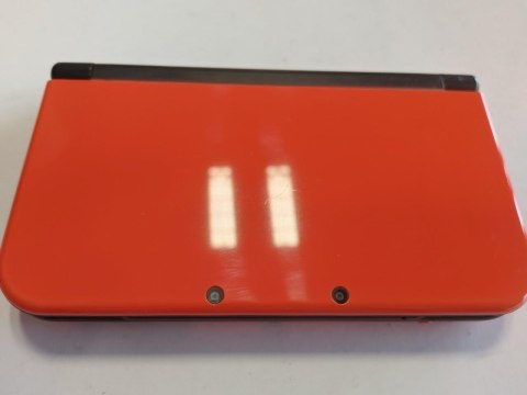 KONSOLA NEW NINTENDO 3DS XL POMARAŃCZOWO-CZARNA + RYSIK + ŁADOWARKA KONSOLA NEW NINTENDO 3DS XL POMARAŃCZOWO-CZARNA + RYSIK + ŁADOWARKA