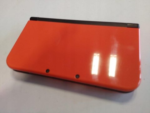 KONSOLA NEW NINTENDO 3DS XL POMARAŃCZOWO-CZARNA + RYSIK + ŁADOWARKA KONSOLA NEW NINTENDO 3DS XL POMARAŃCZOWO-CZARNA + RYSIK + ŁADOWARKA