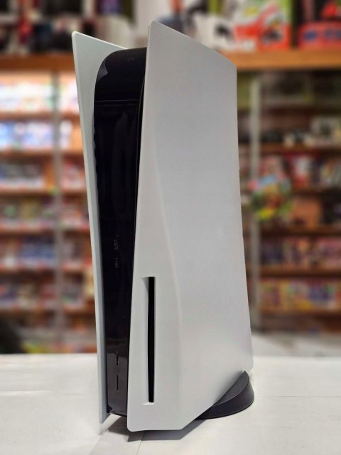 KONSOLA SONY PLAYSTATION 5 Z NAPĘDEM + PAD + ŁADOWARKA + 5 GIER KONSOLA SONY PLAYSTATION 5 Z NAPĘDEM + PAD + ŁADOWARKA + 5 GIER
