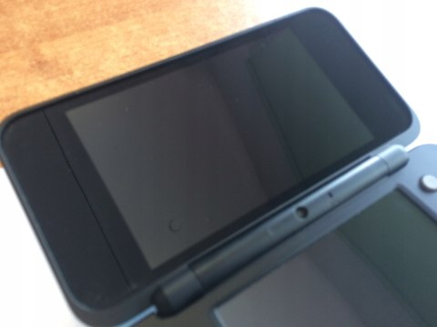 KONSOLA NEW NINTENDO 2DS XL NIEBIESKO-CZARNA + ŁADOWARKA + RYSIK + ETUI KONSOLA NEW NINTENDO 2DS XL NIEBIESKO-CZARNA + ŁADOWARKA + RYSIK + ETUI
