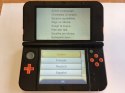 KONSOLA NEW NINTENDO 3DS XL POMARAŃCZOWO-CZARNA + RYSIK + USB + ETUI