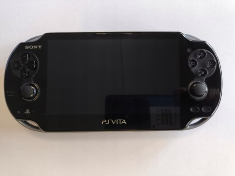 KONSOLA SONY PS VITA OLED WI-FI/3G + KARTA 4GB + ŁADOWARKA KONSOLA SONY PS VITA OLED WI-FI/3G + KARTA 4GB + ŁADOWARKA