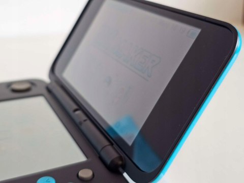 ZADBANA KONSOLA NEW NINTENDO 2DS XL NIEBIESKO-CZARNA + ŁADOWARKA + PUDEŁKO ZADBANA KONSOLA NEW NINTENDO 2DS XL NIEBIESKO-CZARNA + ŁADOWARKA + PUDEŁKO