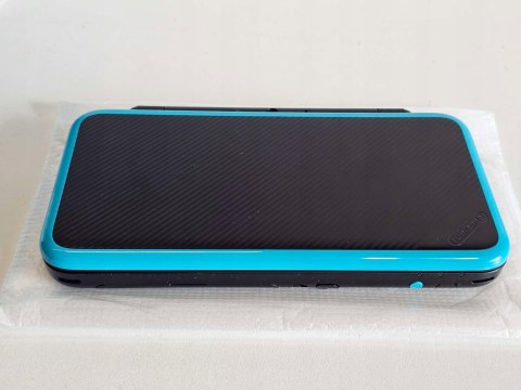 ZADBANA KONSOLA NEW NINTENDO 2DS XL NIEBIESKO-CZARNA + ŁADOWARKA + PUDEŁKO ZADBANA KONSOLA NEW NINTENDO 2DS XL NIEBIESKO-CZARNA + ŁADOWARKA + PUDEŁKO