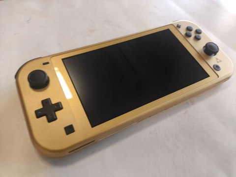 IDEALNA KONSOLA NINTENDO SWITCH LITE ZELDA HYRULE EDITION IDEALNA KONSOLA NINTENDO SWITCH LITE ZELDA HYRULE EDITION