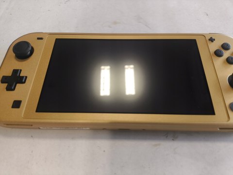 IDEALNA KONSOLA NINTENDO SWITCH LITE ZELDA HYRULE EDITION IDEALNA KONSOLA NINTENDO SWITCH LITE ZELDA HYRULE EDITION