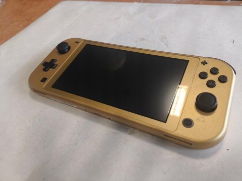 IDEALNA KONSOLA NINTENDO SWITCH LITE ZELDA HYRULE EDITION IDEALNA KONSOLA NINTENDO SWITCH LITE ZELDA HYRULE EDITION