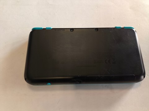 KONSOLA NEW NINTENDO 2DS XL NIEBIESKO-CZARNA + ŁADOWARKA + ZELDA OCARINA 3D KONSOLA NEW NINTENDO 2DS XL NIEBIESKO-CZARNA + ŁADOWARKA + ZELDA OCARINA 3D