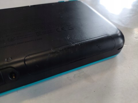 KONSOLA NEW NINTENDO 2DS XL NIEBIESKO-CZARNA + ŁADOWARKA + ZELDA OCARINA 3D KONSOLA NEW NINTENDO 2DS XL NIEBIESKO-CZARNA + ŁADOWARKA + ZELDA OCARINA 3D
