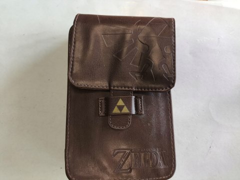 KONSOLA NEW NINTENDO 2DS XL NIEBIESKO-CZARNA + ŁADOWARKA + ZELDA OCARINA 3D KONSOLA NEW NINTENDO 2DS XL NIEBIESKO-CZARNA + ŁADOWARKA + ZELDA OCARINA 3D