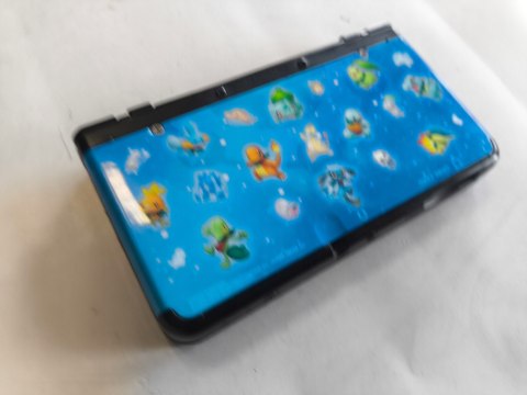KONSOLA NEW NINTENDO 3DS CZARNA + POKEMON COVER PLATE + ŁADOWARKA KONSOLA NEW NINTENDO 3DS CZARNA + POKEMON COVER PLATE + ŁADOWARKA