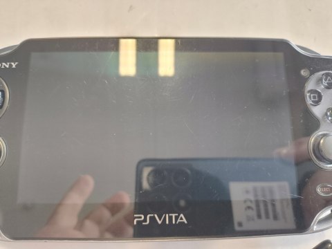 KONSOLA SONY PS VITA OLED WI-FI + KARTA 4GB + ŁADOWARKA KONSOLA SONY PS VITA OLED WI-FI + KARTA 4GB + ŁADOWARKA