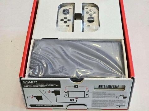 IDEALNA KONSOLA NINTENDO SWITCH OLED 64GB BIAŁA IDEALNA KONSOLA NINTENDO SWITCH OLED 64GB BIAŁA