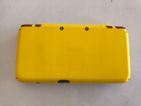 KONSOLA NEW NINTENDO 2DS XL EDYCJA PIKACHU + PUDEŁKO + RYSIK + ŁADOWARKA KONSOLA NEW NINTENDO 2DS XL EDYCJA PIKACHU + PUDEŁKO + RYSIK + ŁADOWARKA