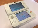 KONSOLA NEW NINTENDO 3DS BIAŁA + ŁADOWARKA + RYSIK + PUDEŁKO