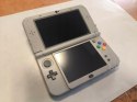 KONSOLA NEW NINTENDO 3DS XL SNES EDITION + 2 GRY POKEMON + RYSIK + USB