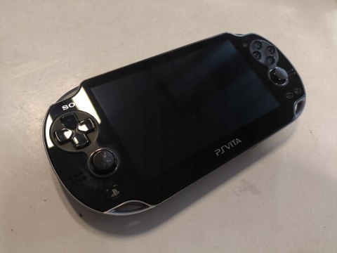 KONSOLA SONY PS VITA OLED WI-FI + KARTA 16GB + PUDEŁKO + ŁADOWARKA KONSOLA SONY PS VITA OLED WI-FI + KARTA 16GB + PUDEŁKO + ŁADOWARKA