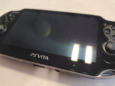 KONSOLA SONY PS VITA OLED WI-FI + KARTA 16GB + PUDEŁKO + ŁADOWARKA KONSOLA SONY PS VITA OLED WI-FI + KARTA 16GB + PUDEŁKO + ŁADOWARKA