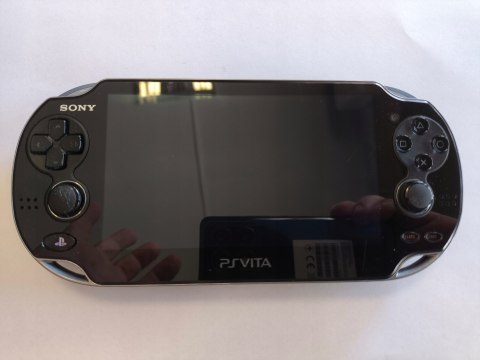 KONSOLA SONY PS VITA OLED WI-FI + KARTA 8GB + ŁADOWARKA KONSOLA SONY PS VITA OLED WI-FI + KARTA 8GB + ŁADOWARKA