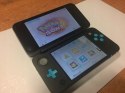 KONSOLA NEW NINTENDO 2DS XL NIEBIESKO-CZARNA + ŁADOWARKA + POKEMON SUN