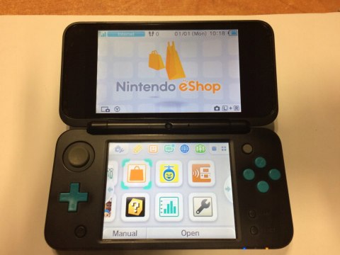 KONSOLA NEW NINTENDO 2DS XL NIEBIESKO-CZARNA + ŁADOWARKA + RYSIK + ETUI