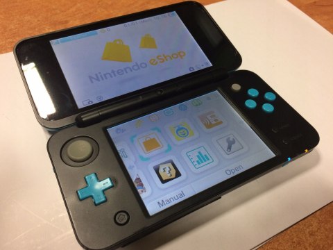 KONSOLA NEW NINTENDO 2DS XL NIEBIESKO-CZARNA + ŁADOWARKA + RYSIK + ETUI