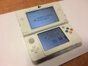 KONSOLA NEW NINTENDO 3DS BIAŁA + ŁADOWARKA + RYSIK