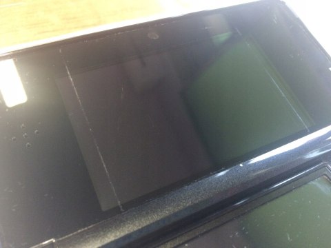 KONSOLA NINTENDO 3DS CZARNA + ŁADOWARKA + RYSIK + NEW SUPER MARIO BROS 2