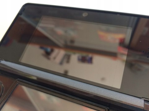 KONSOLA NINTENDO 3DS CZARNA + ŁADOWARKA + RYSIK + KARTA PAMIĘCI + 9 GIER