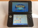 KONSOLA NINTENDO 3DS XL SREBRNO-CZARNA + RYSIK + POKEMON ALPHA SAPPHIRE