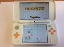 KONSOLA NEW NINTENDO 2DS XL BIAŁO-POMARAŃCZKOWA + USB + RYSIK + ETUI