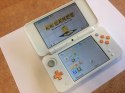 KONSOLA NEW NINTENDO 2DS XL BIAŁO-POMARAŃCZKOWA + USB + RYSIK + ETUI