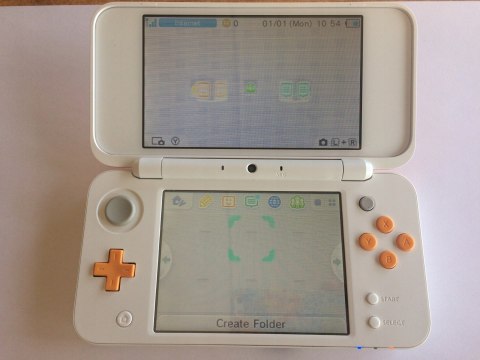 KONSOLA NEW NINTENDO 2DS XL BIAŁO-POMARAŃCZKOWA + USB + RYSIK