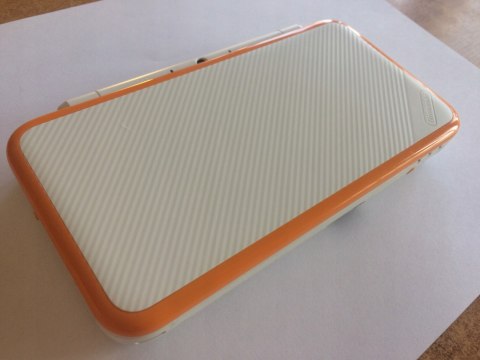 KONSOLA NEW NINTENDO 2DS XL BIAŁO-POMARAŃCZKOWA + USB + RYSIK