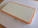 KONSOLA NEW NINTENDO 2DS XL BIAŁO-POMARAŃCZKOWA + USB + RYSIK