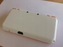 KONSOLA NEW NINTENDO 2DS XL BIAŁO-POMARAŃCZKOWA + USB + RYSIK