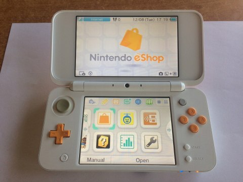 KONSOLA NEW NINTENDO 2DS XL BIAŁO-POMARAŃCZOWA + ŁADOWARKA +RYSIK + PUDEŁKO