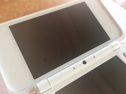 KONSOLA NEW NINTENDO 2DS XL BIAŁO-POMARAŃCZOWA + ŁADOWARKA +RYSIK + PUDEŁKO