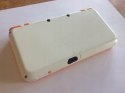 KONSOLA NEW NINTENDO 2DS XL BIAŁO-POMARAŃCZOWA + ŁADOWARKA +RYSIK + PUDEŁKO