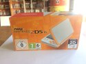 KONSOLA NEW NINTENDO 2DS XL BIAŁO-POMARAŃCZOWA + ŁADOWARKA +RYSIK + PUDEŁKO