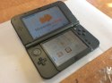 KONSOLA NEW NINTENDO 3DS XL CZARNA IPS + ŁADOWARKA + RYSIK