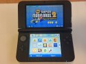 KONSOLA NINTENDO 3DS XL CZERWONA + NEW SUPER MARIO BROS 2 SPECIAL EDITION