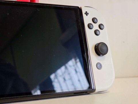 ZADBANA KONSOLA NINTENDO SWITCH OLED BIAŁA KOMEPLT + FIFA + SPORTS