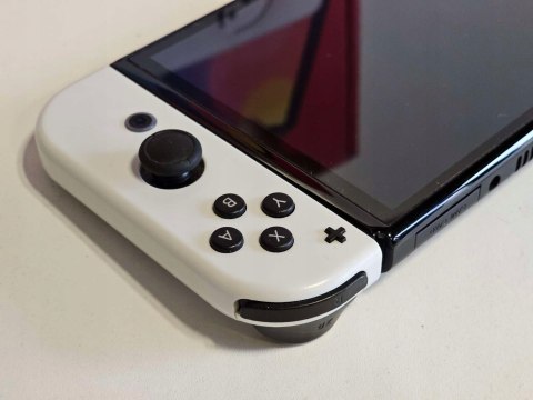 ZADBANA KONSOLA NINTENDO SWITCH OLED BIAŁA KOMEPLT + FIFA + SPORTS